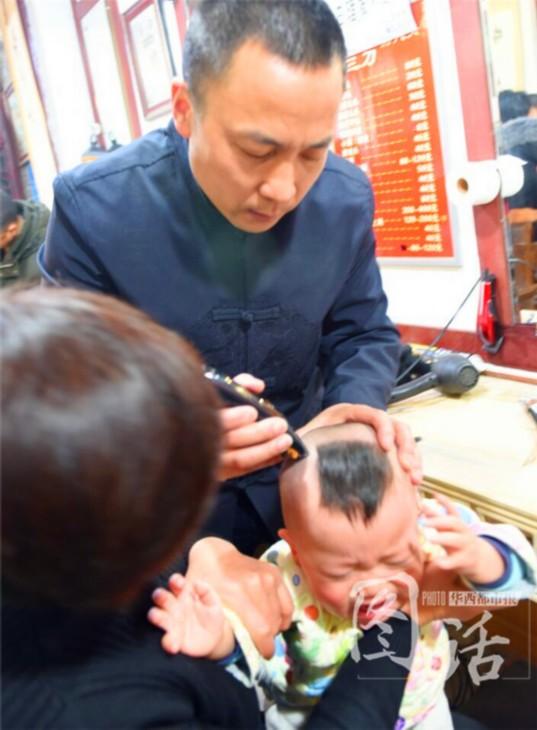 Chinese Babies Get Haircuts For Longtaitou Festival All China