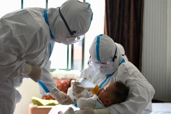 Temporary 'Mothers' Take Care of Baby of Cured COVID-19 Patient