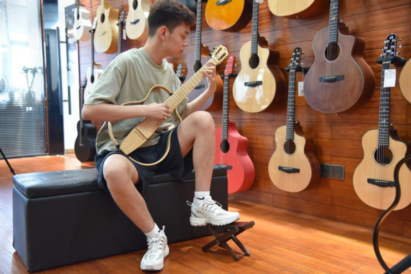 Chinese Guitar-Making Industry Rides on Wave of Belt and Road Initiative