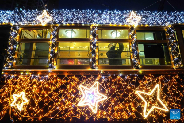 Trams Decorated with Lights to Attract Tourists in Dalian, China's Liaoning