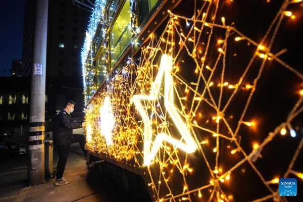 Trams Decorated with Lights to Attract Tourists in Dalian, China's Liaoning