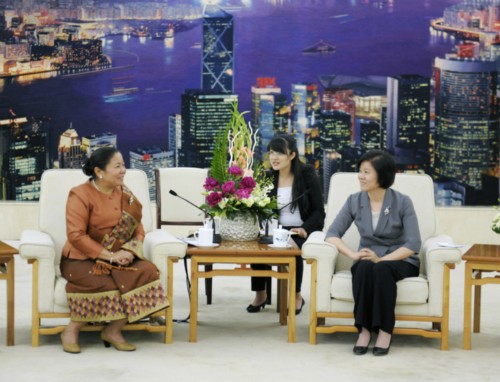 Vice Chairperson of the Standing Committee of China's National People's Congress (NPC) and President of the All-China Women's Federation (ACWF) Shen Yueyue (R) and President of the Lao Women's Union Sysay Leudemounsone [Women of China/Fan Wenjun]