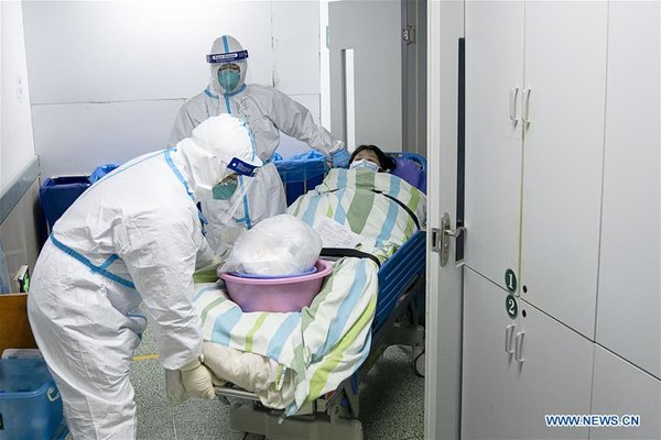 Medical Workers Take Care of Patients in Wuhan