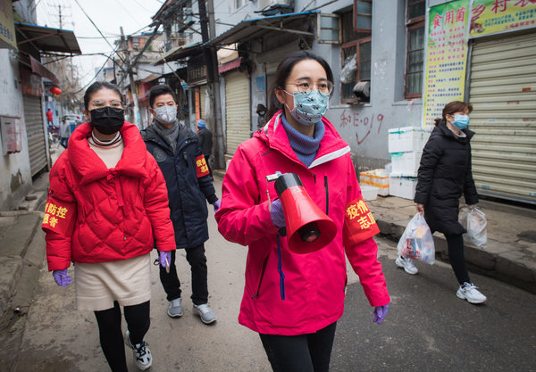 Wuhan Combs Communities to Leave No Coronavirus Patient Unattended