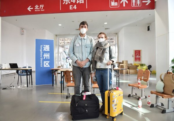 China Guards Against Imported Cases As Overseas COVID-19 Infections Soar