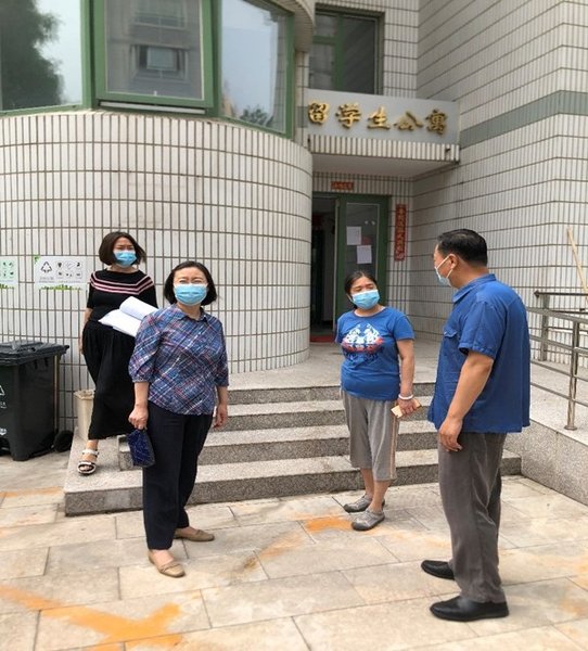 CWU Leaders Inspect School's Flood Prevention Measures