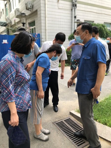 CWU Leaders Inspect School's Flood Prevention Measures