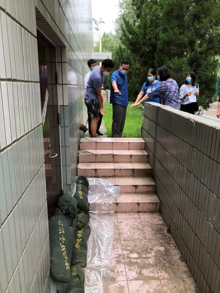 CWU Leaders Inspect School's Flood Prevention Measures