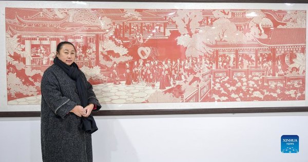 Folk Artist Tells Chinese Story by Paper Cutting