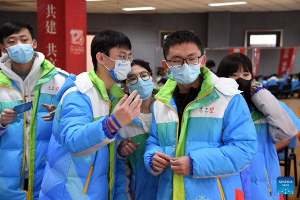 Volunteers for Beijing Olympics Attend Training Session to Develop Skills