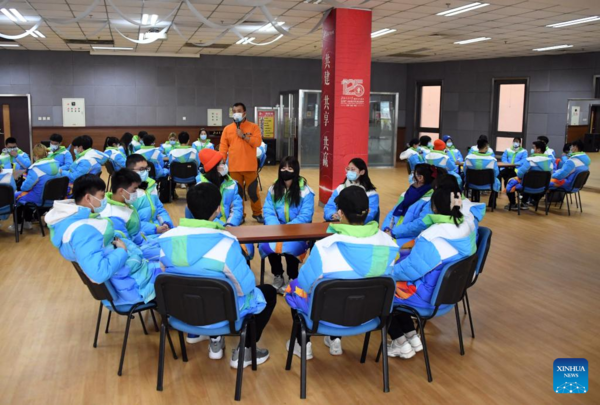 Volunteers for Beijing Olympics Attend Training Session to Develop Skills