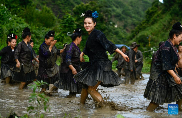 Villagers Perform Water Drum Dance in Jianhe County, SW China