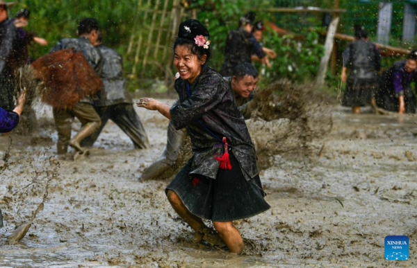 Villagers Perform Water Drum Dance in Jianhe County, SW China