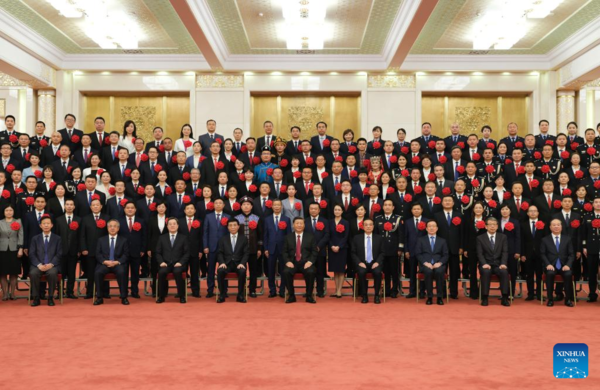 Xi Meets Model Civil Servants