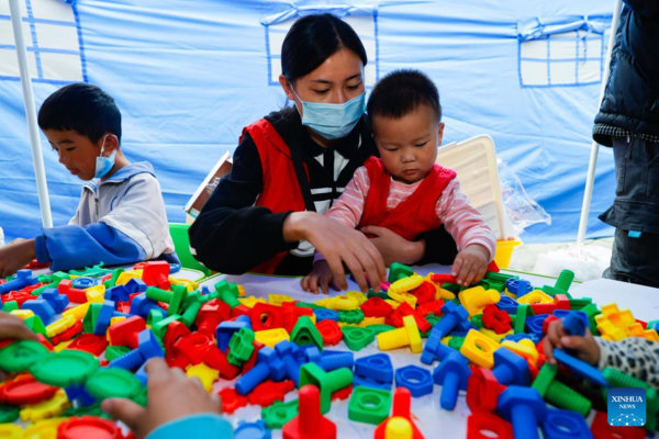 Children's Center Set up at Quake Relief Shelter in Luding County