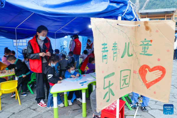 Children's Center Set up at Quake Relief Shelter in Luding County