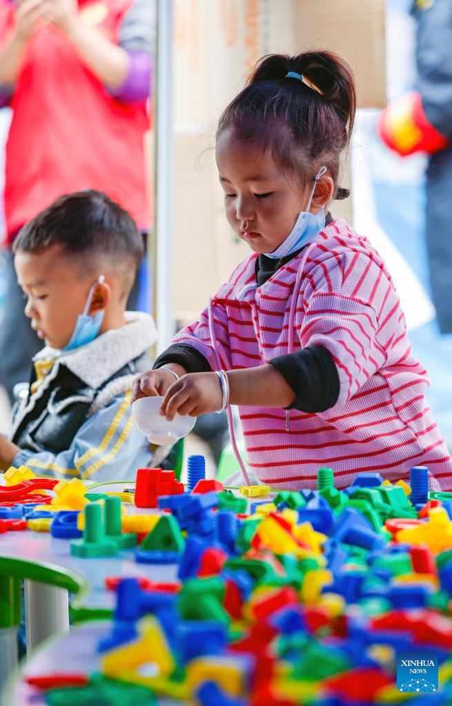 Children's Center Set up at Quake Relief Shelter in Luding County