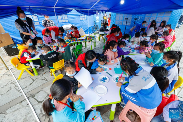 Children's Center Set up at Quake Relief Shelter in Luding County