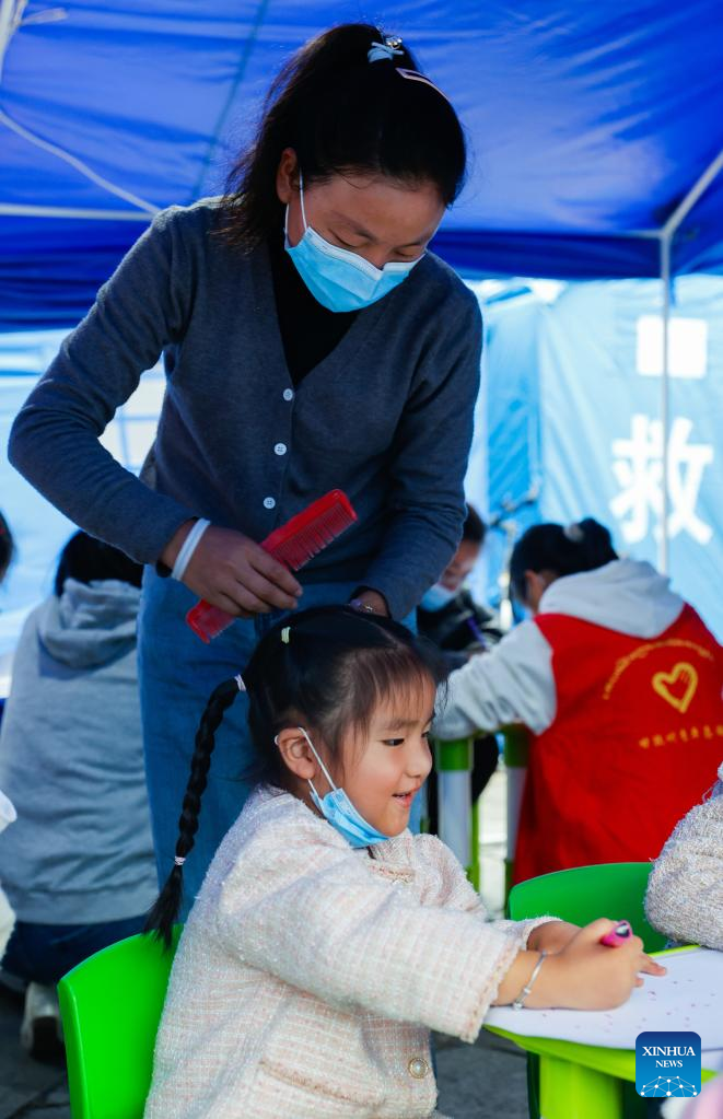 Children's Center Set up at Quake Relief Shelter in Luding County