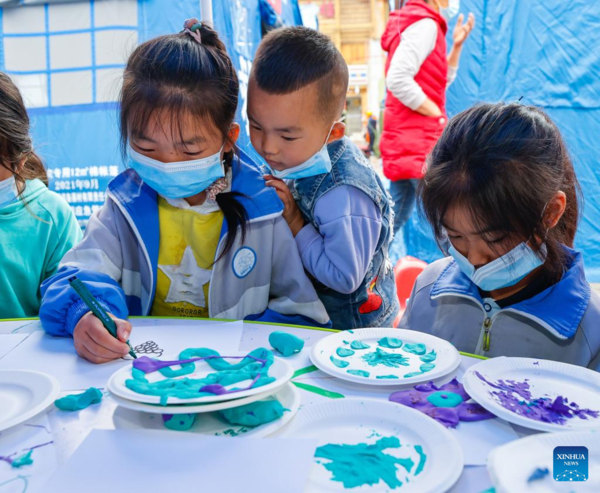 Children's Center Set up at Quake Relief Shelter in Luding County