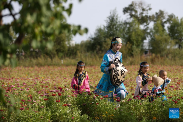 Hezhe People Enjoy Colorful Life in Heilongjiang, NE China
