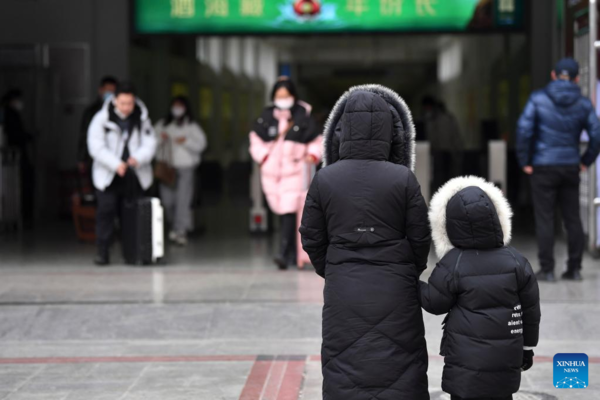 People on Their Way for Family Reunions During Spring Festival Travel Rush