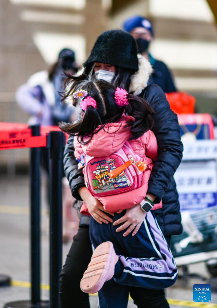 People on Their Way for Family Reunions During Spring Festival Travel Rush