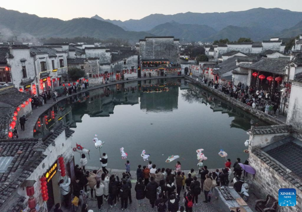 Tourists Take Part in Lantern Parade to Celebrate Chinese New Year in E China's Anhui