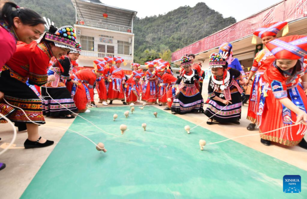 Spining Top Competition Held to Celebrate Upcoming Int'l Women's Day in S China's Guangxi