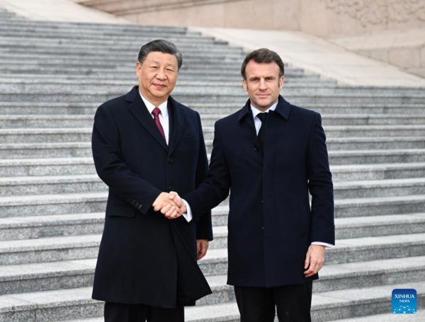 Xi Holds Talks with French President