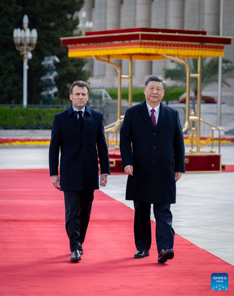 Xi Holds Talks with French President