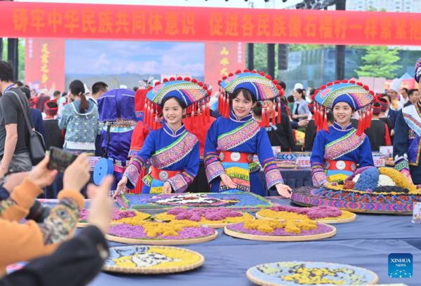 Gourmet Competition Marks Traditional Sanyuesan Festival in S China's Guangxi