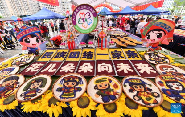 Gourmet Competition Marks Traditional Sanyuesan Festival in S China's Guangxi