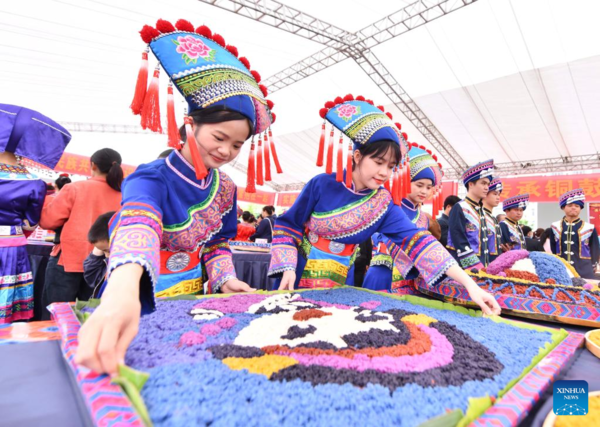 Gourmet Competition Marks Traditional Sanyuesan Festival in S China's Guangxi