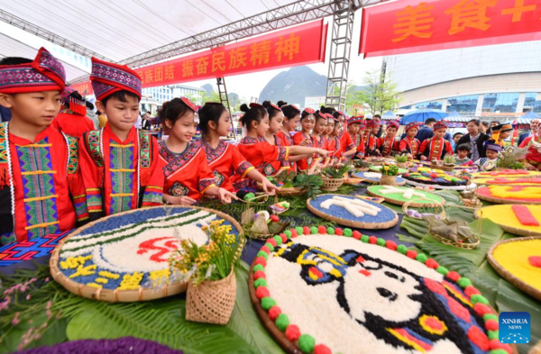 Gourmet Competition Marks Traditional Sanyuesan Festival in S China's Guangxi