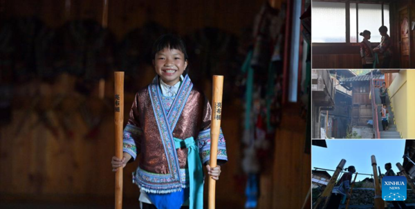 Students Learn About Intangible Cultural Heritages in Summer Vacation in Guangxi, S China