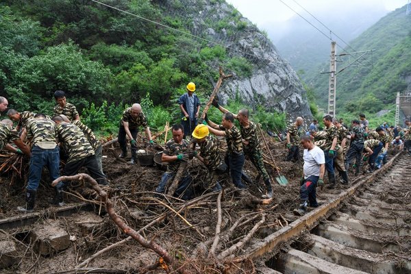 Xi Leads Way in Combating Beijing, Hebei Floods