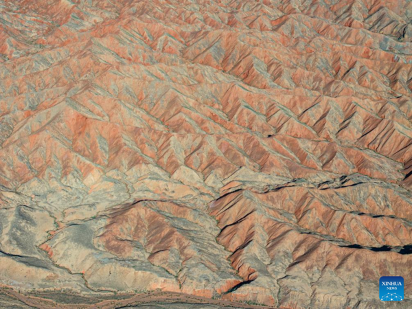 Danxia National Geological Park in NW China Attracts Tourists with Unique Landscape