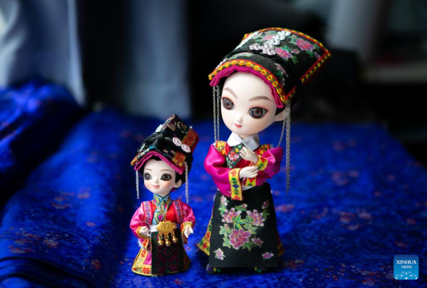 Handmade Dolls Bring Fortunes to Local Residents in SW China's County