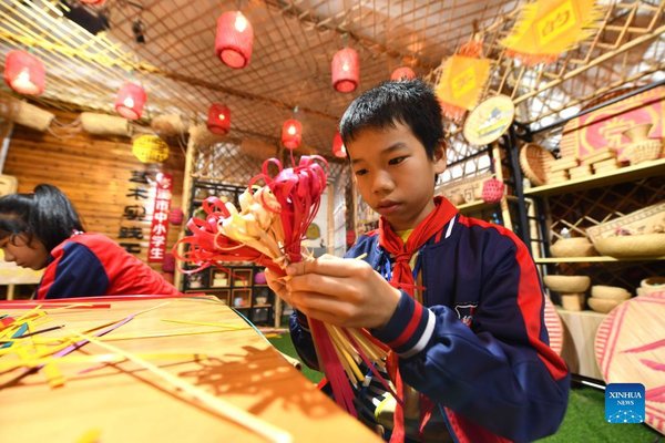 Students Learn Bamboo Weaving Skill in South China's Guangxi