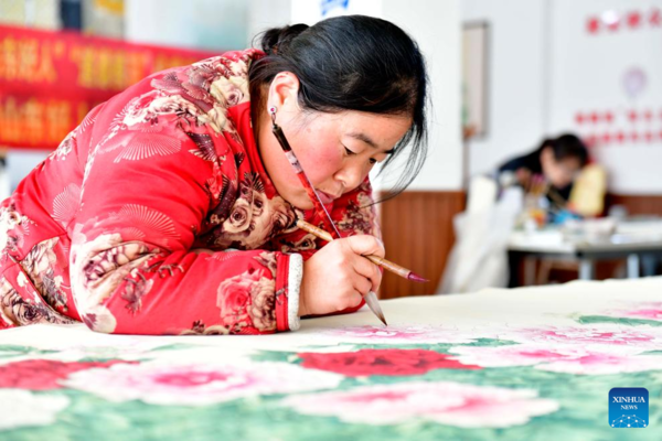 Peony-Themed Realistic Painting Propels Rural Prosperity in E China's Shandong