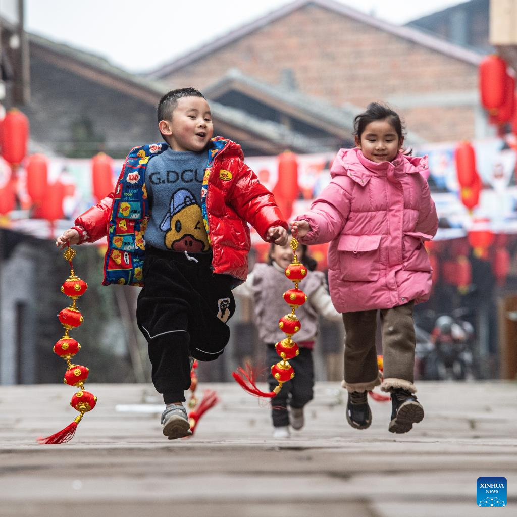Decorations Set up to Celebrate Upcoming Spring Festival in Yongxi Ancient Town, SW China
