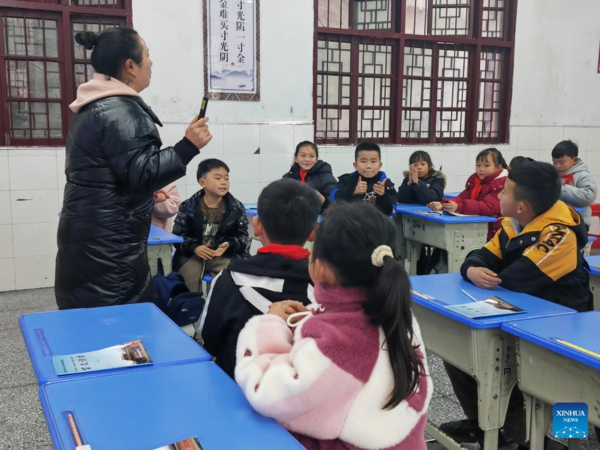 Feature: Passing down Language Without Writing System to Schoolkids in Miao Ethnic Village