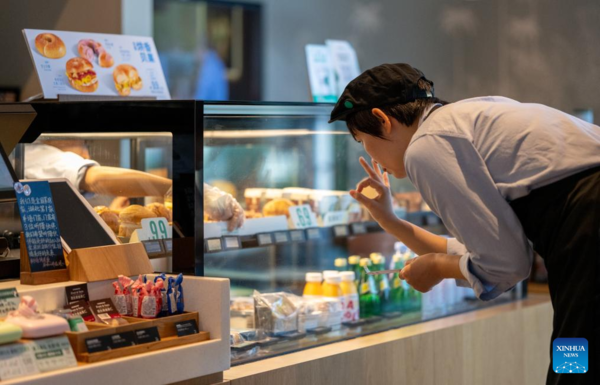 Deaf Barista's Love Brews in a Cup of Coffee