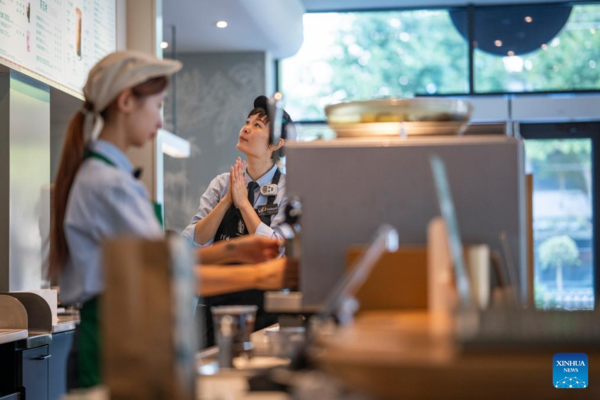 Deaf Barista's Love Brews in a Cup of Coffee