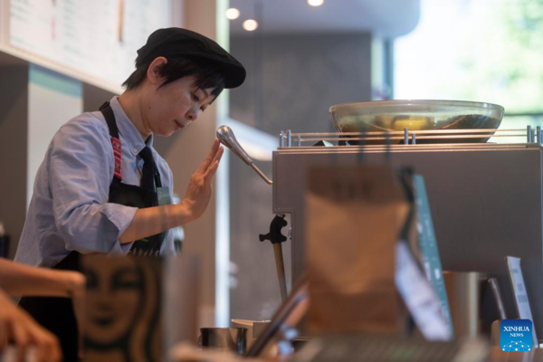 Deaf Barista's Love Brews in a Cup of Coffee