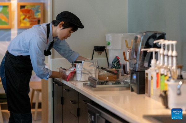 Deaf Barista's Love Brews in a Cup of Coffee