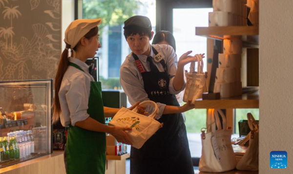 Deaf Barista's Love Brews in a Cup of Coffee