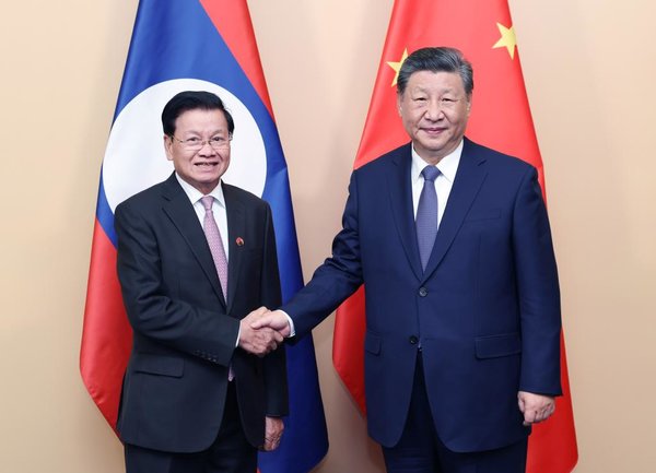 Xi Urges China, Laos to Forge Model for BRI Cooperation