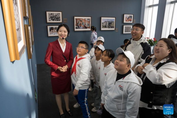 Students, Teachers Visit Photo Exhibition on China's Historic Transformation in Beijing